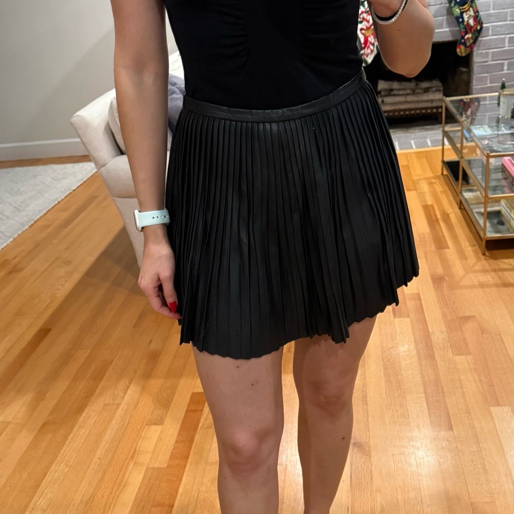 Black leather pleated Intermix mini skirt, size M